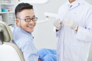 happy-asian-patient-at-dentists-AGHQC8G (1)